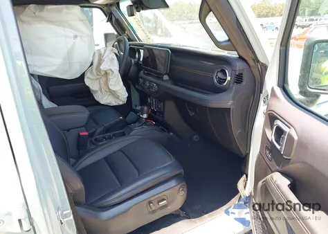 2024 Jeep Wrangler Sahara z USA, uszkodzony, nr VIN 1C4PJXEG2RW377739